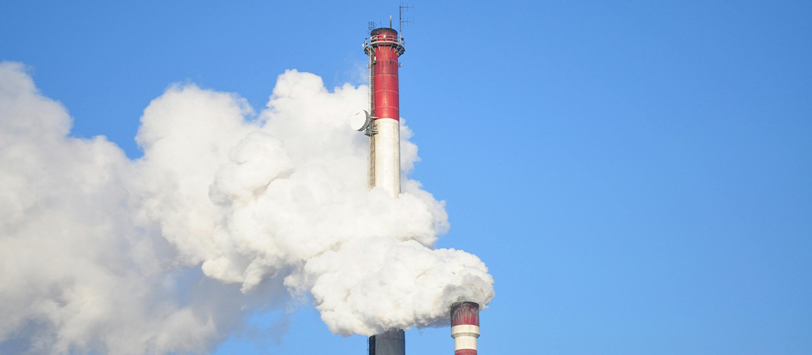 cheminée rouge blanche usine